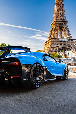 Blue Bugatti Chiron Pur Sport Parked in Front of the Eiffel Tower in Paris HD phone wallpaper