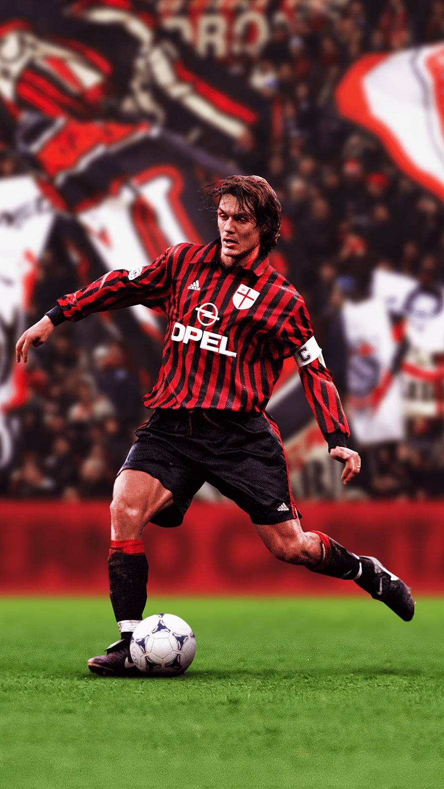 Paolo Maldini in AC Milan Red and Black Striped Kit Dribbling Ball on Pitch HD phone wallpaper