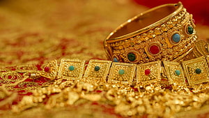 Traditional Indian Gold Bangle and Necklace Set With Gemstone Accents HD wallpaper