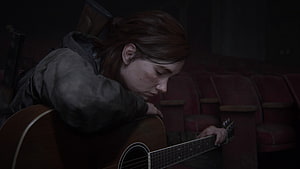 Ellie from The Last of Us Part II resting on an acoustic guitar in a dimly lit theater HD wallpaper