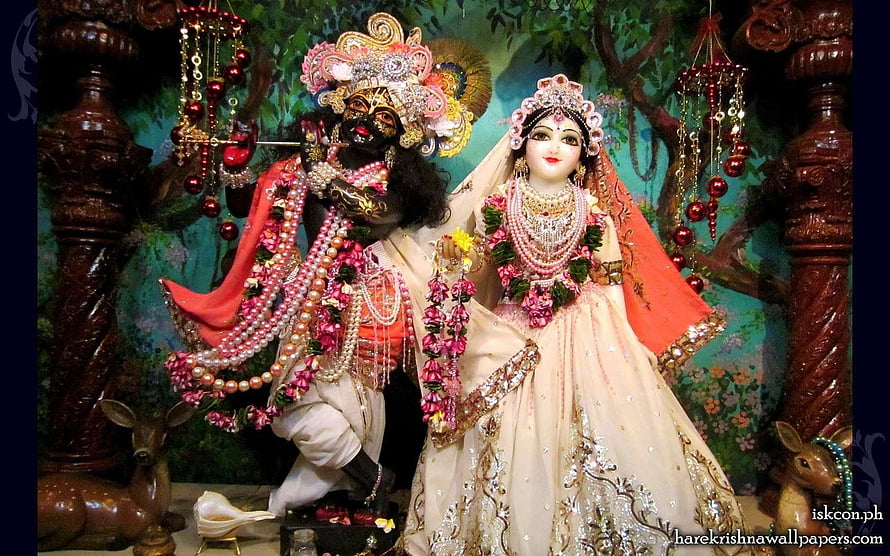 Hare Krishna Deities in Ornate Temple Setting with Floral Garlands and Traditional Attire HD wallpaper