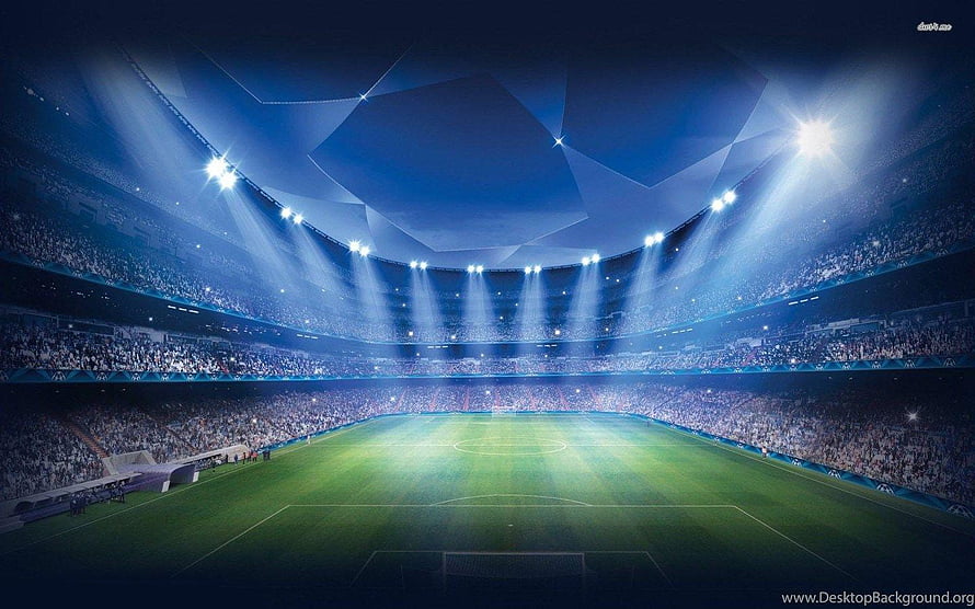 Illuminated Football Stadium Interior with Bright Floodlights and Full Crowd HD wallpaper