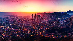 Grand Theft Auto V Los Santos Cityscape at Sunset with Vibrant Skyline and Mountain Silhouettes HD wallpaper