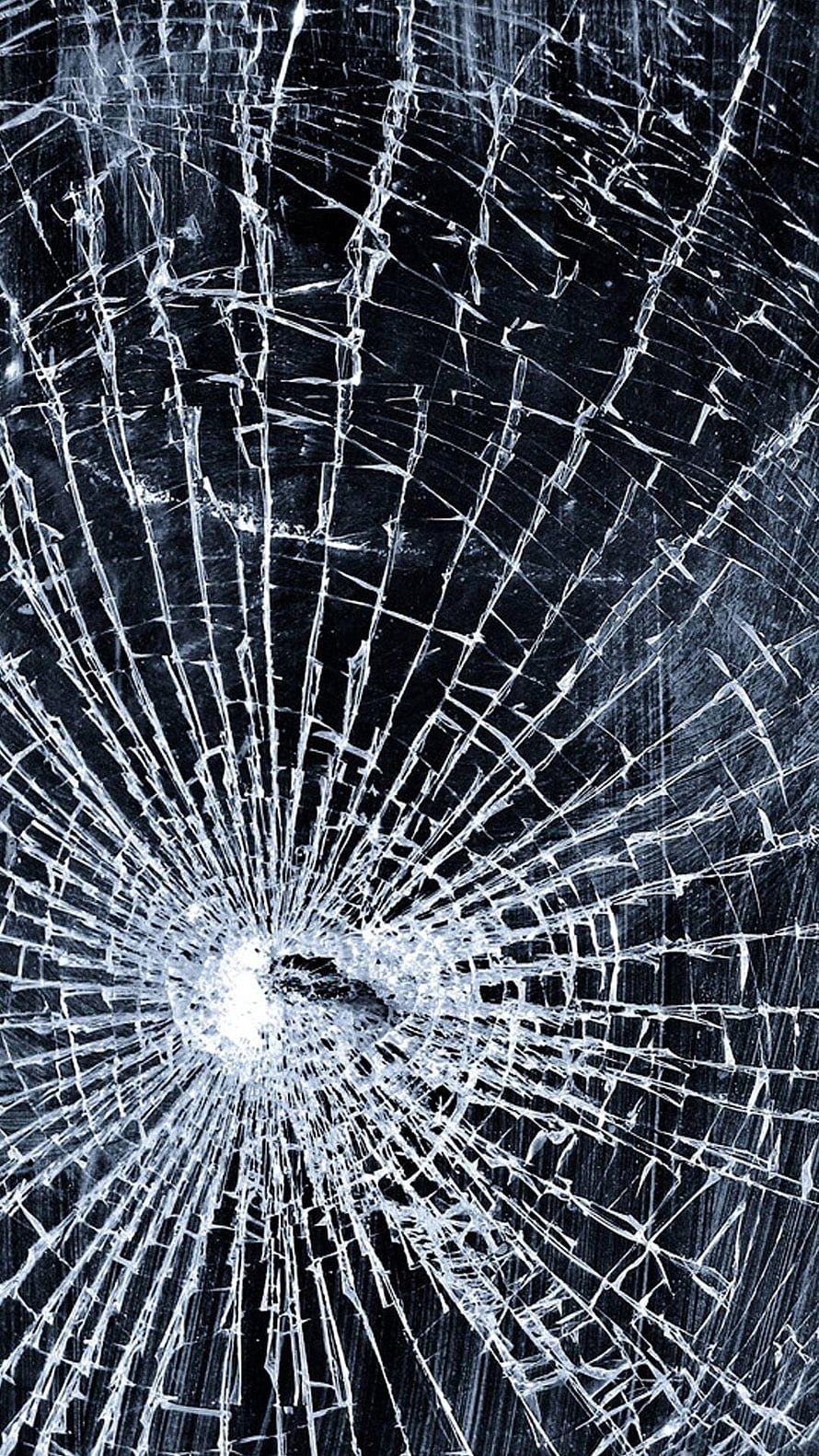 Shattered Glass Texture with Radiating Fracture Lines on Dark Background HD phone wallpaper