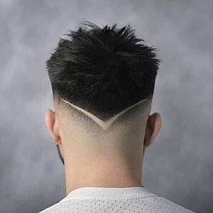 Modern Men's Fade Haircut with Sharp V-Shape Design and Textured Top HD phone wallpaper