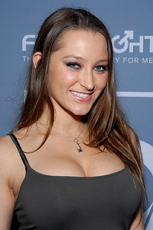 Dani Daniels smiling portrait in black tank top with key necklace at event HD phone wallpaper