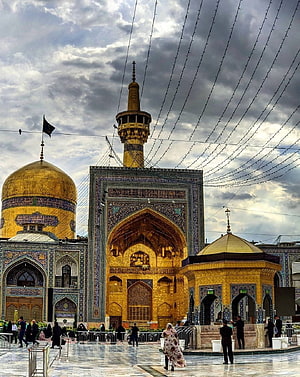 Imam Reza Shrine Golden Dome and Iwan in Mashhad Under Dramatic Clouds HD phone wallpaper