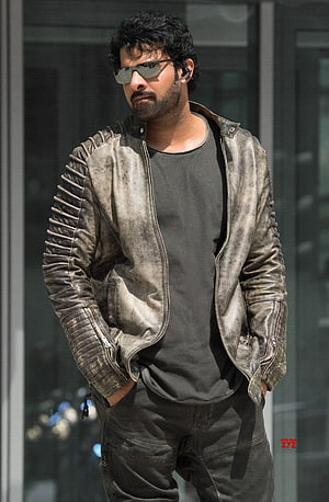 Prabhas in distressed leather jacket and sunglasses from the film Saaho HD phone wallpaper