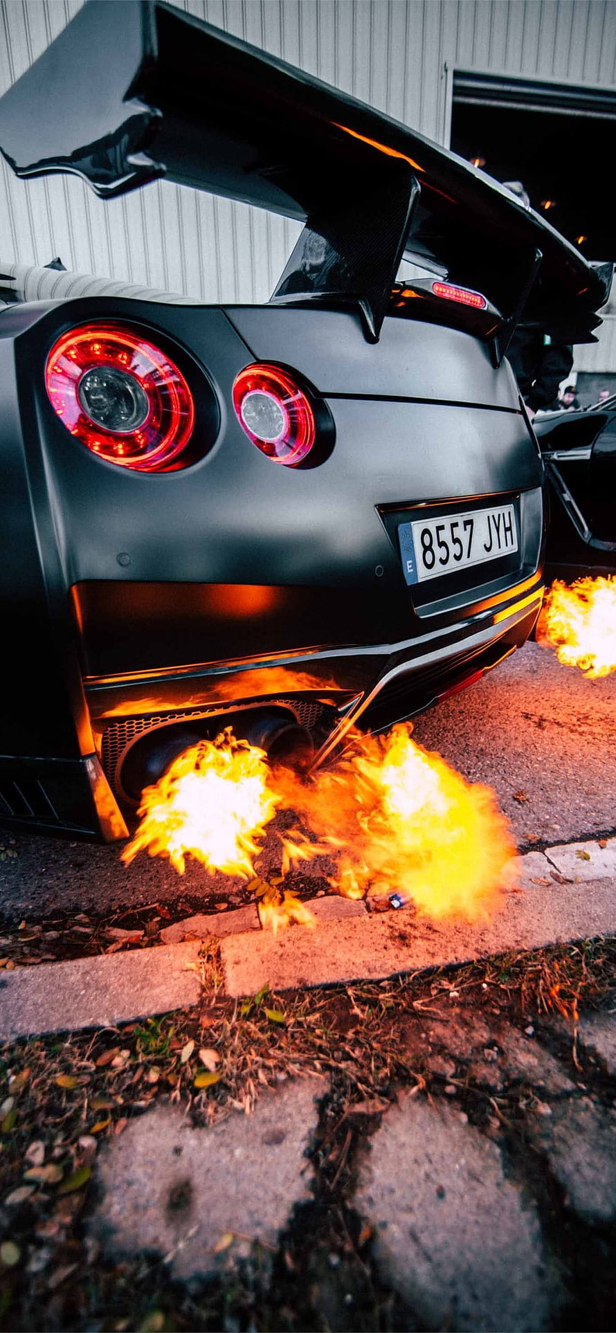 Nissan GT-R R35 Rear View With Exhaust Flames and Carbon Fiber Wing HD phone wallpaper