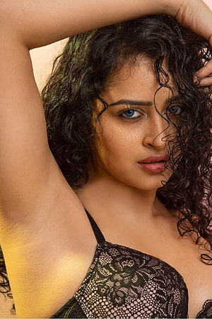 Apsara Rani Portrait in Black Lace with Curly Hair and Blue Eyes HD phone wallpaper
