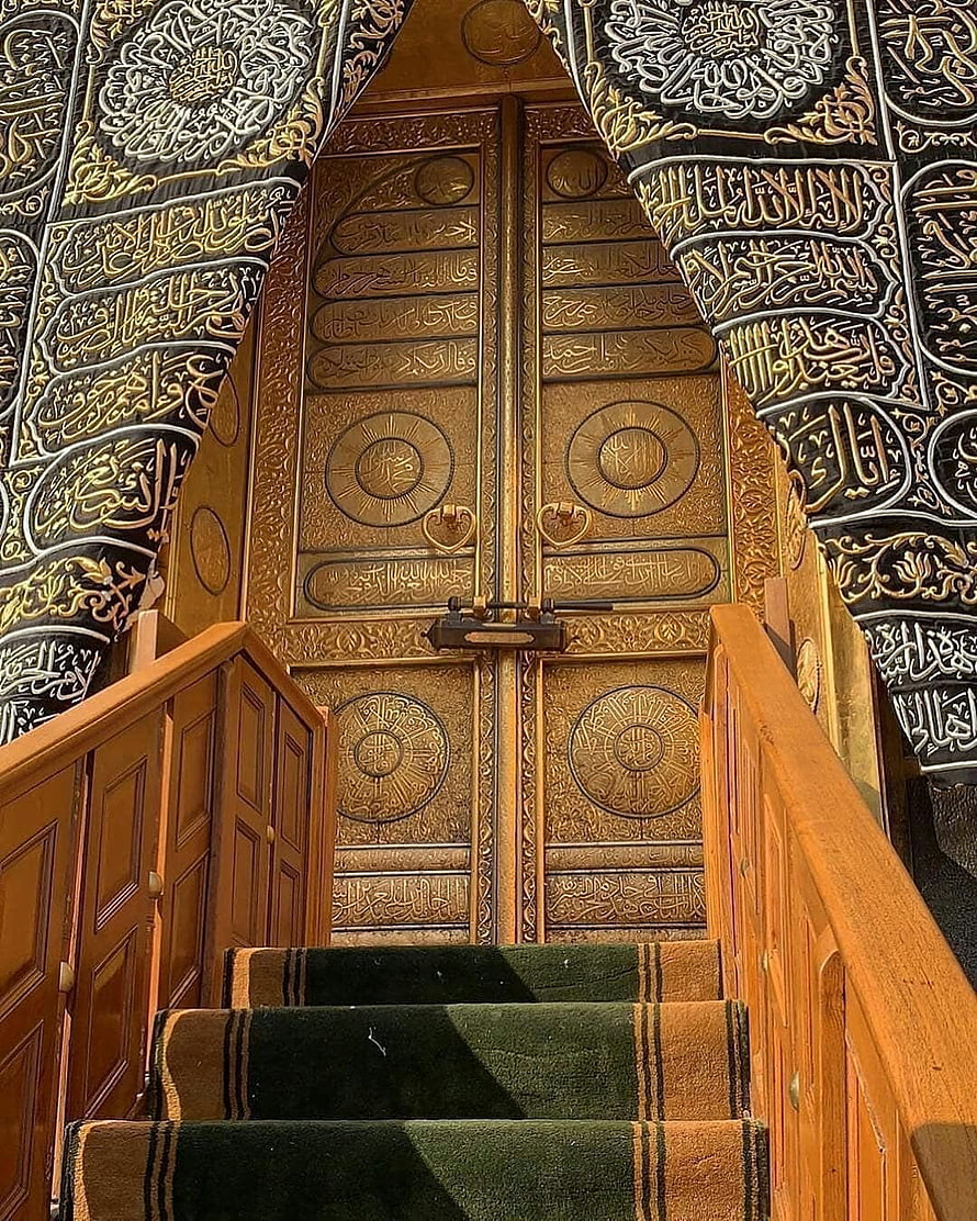 Ornate Golden Kaaba Doorway with Arabic Calligraphy and Carpeted Staircase HD phone wallpaper