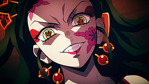Daki from Demon Slayer with floral face markings and golden kanji eyes in dramatic anime close-up HD wallpaper