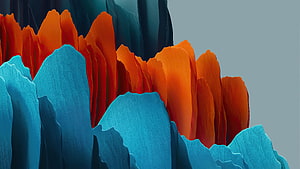 Vibrant Abstract Mountain Landscape with Orange and Blue Peaks HD wallpaper