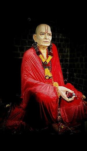 Swami Samartha Statue in Red Robes with Rudraksha Beads and Tilak HD phone wallpaper