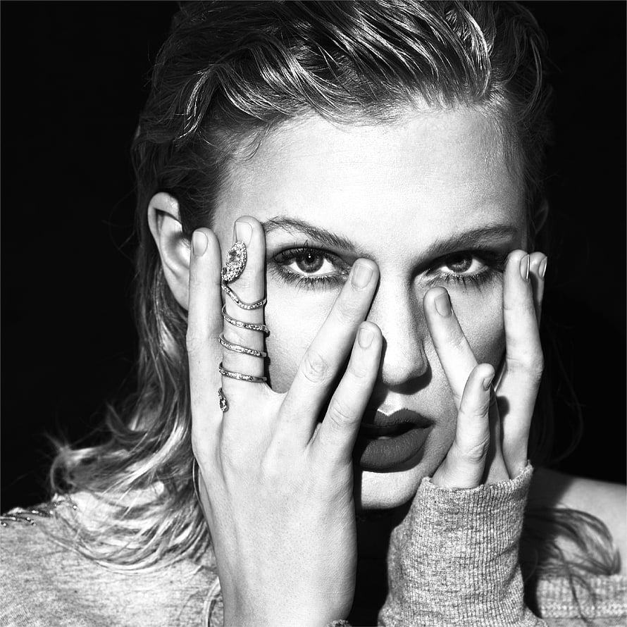 Taylor Swift Black and White Portrait with Hands Framing Face and Diamond Rings HD wallpaper
