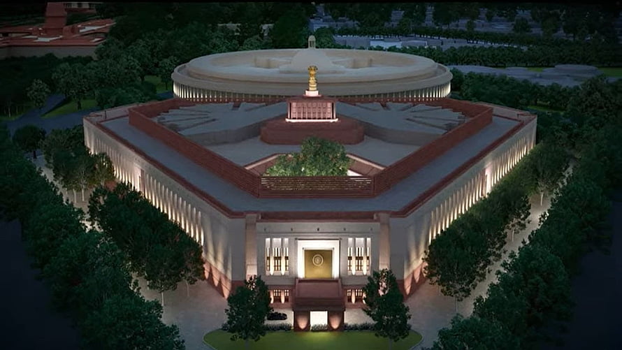 Aerial View of India's New Parliament Building at Night with Illuminated Facade and Central Emblem HD wallpaper