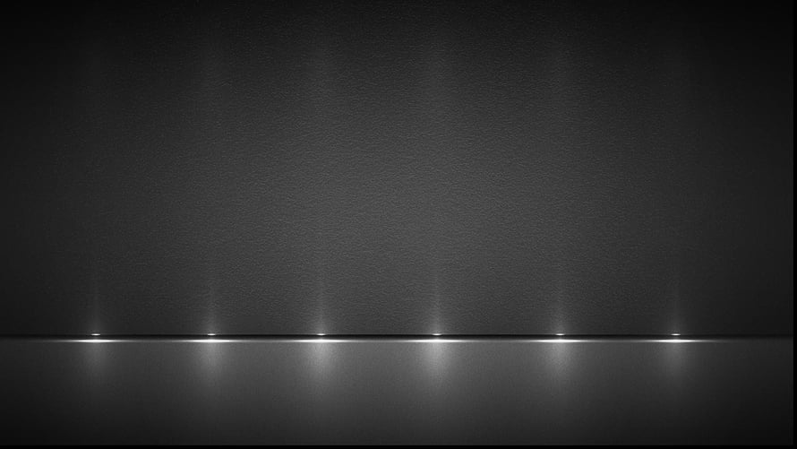 Minimalist Dark Grey Horizon with Reflective Light Points on a Smooth Surface HD wallpaper