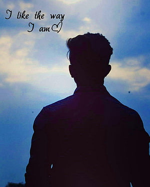 Silhouette of a man looking up at a cloudy blue sky with an inspirational quote HD phone wallpaper