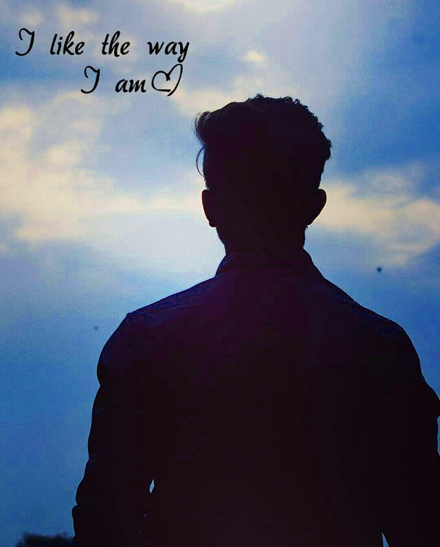 Silhouette of a man looking up at a cloudy blue sky with an inspirational quote HD phone wallpaper