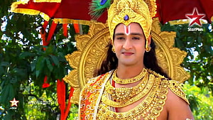 Saurabh Raj Jain as Lord Krishna in Mahabharat with ornate golden crown and peacock feather HD wallpaper