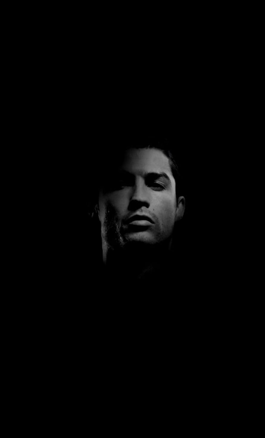 Cristiano Ronaldo Dramatic Black and White Portrait in Deep Shadow HD phone wallpaper