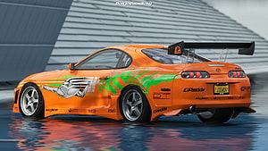 Orange Toyota Supra MK4 with Green Graphics and Large Rear Wing HD wallpaper