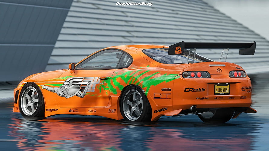 Orange Toyota Supra MK4 with Green Graphics and Large Rear Wing HD wallpaper