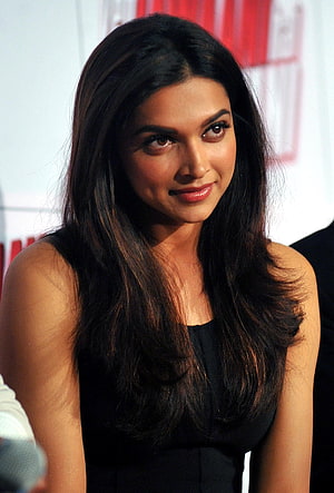 Deepika Padukone in a Black Sleeveless Dress with Long Dark Hair at a Public Event HD phone wallpaper