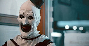 Art the Clown from Terrifier in White Mask and Top Hat HD wallpaper