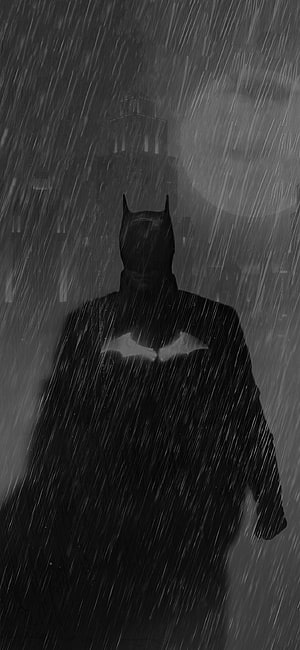Batman Silhouette in Heavy Rain with Gothic Cityscape and Moonlight HD phone wallpaper