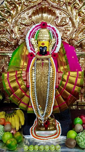 Kolhapur Mahalaxmi Temple Deity Adorned in Gold and Silk with Fruit Offerings HD phone wallpaper