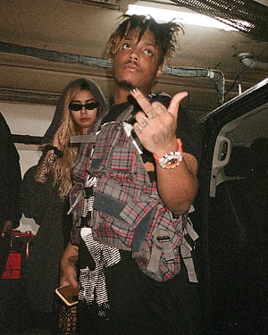 Juice WRLD and Ally in a plaid jacket and hooded outfit inside a vehicle HD phone wallpaper