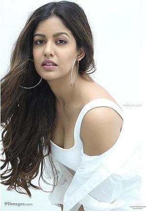 Ishita Dutta Studio Portrait in White Off-Shoulder Top with Long Wavy Hair and Hoop Earrings HD phone wallpaper