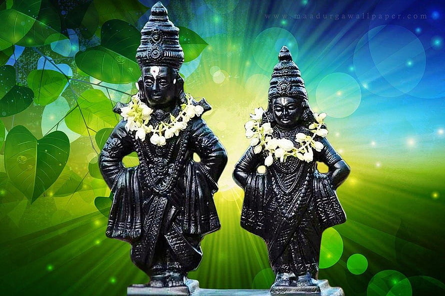 Vitthal and Rukmini Black Stone Idols with Jasmine Garlands on Vibrant Green Background HD wallpaper