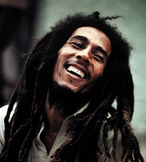 Bob Marley Smiling Portrait With Long Dreadlocks And Bearded Expression HD phone wallpaper