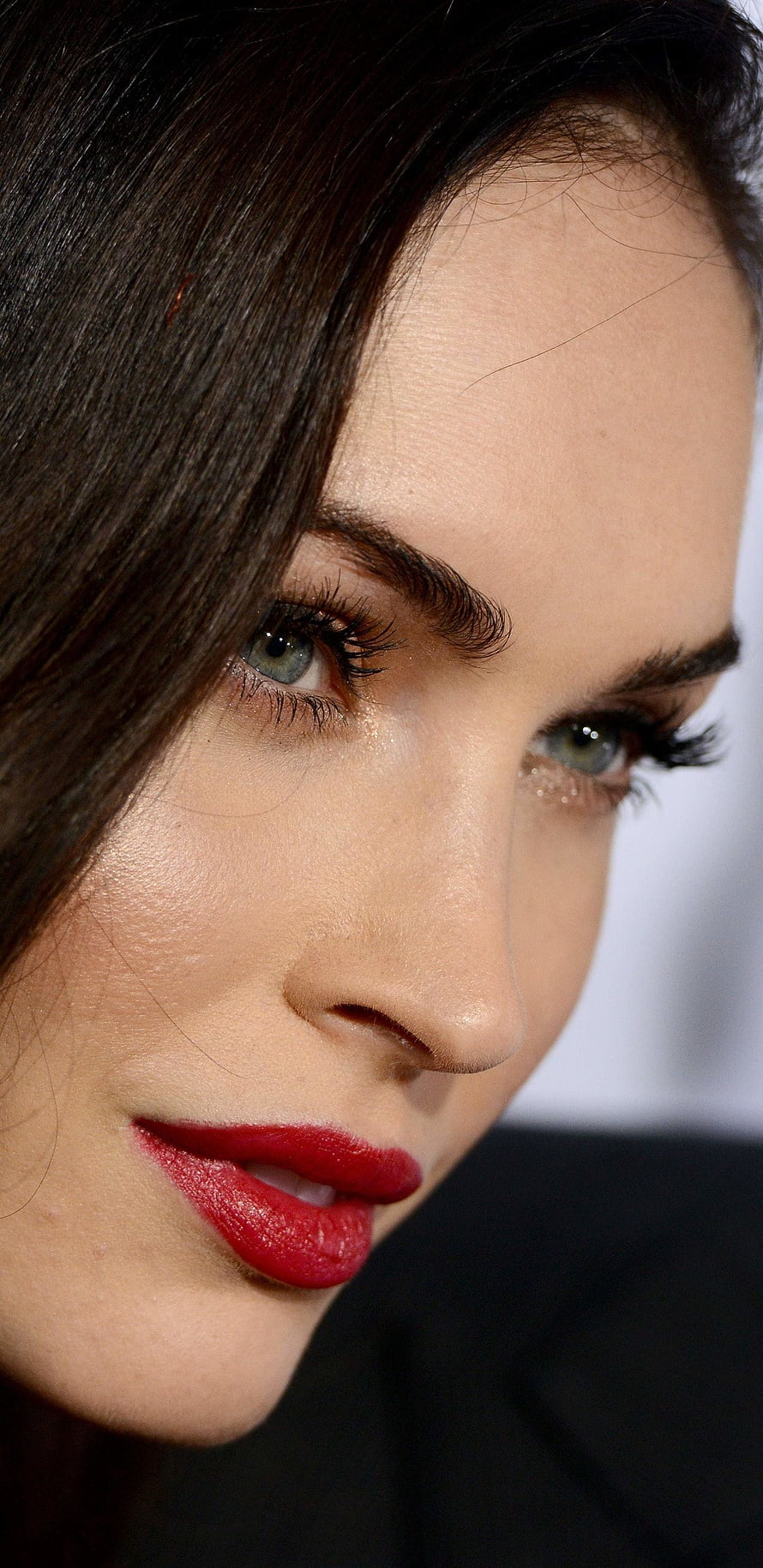 Megan Fox Close-Up Portrait with Red Lipstick and Dark Hair HD phone wallpaper