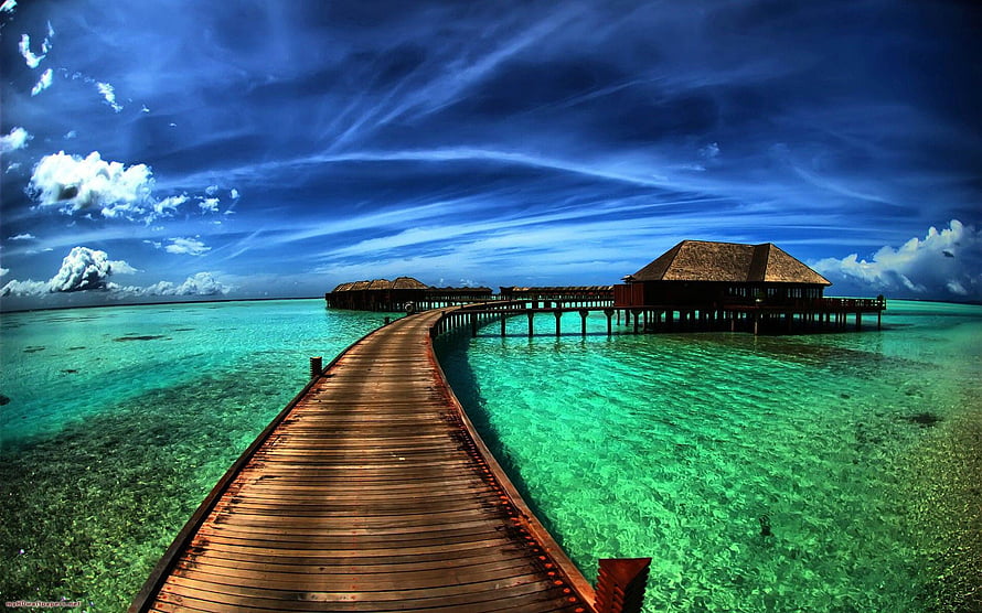 Tropical Overwater Bungalow Resort with Wooden Boardwalk and Turquoise Lagoon HD wallpaper