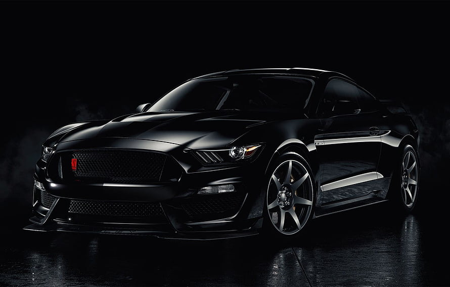 Black Ford Mustang Shelby GT500 in Dark Studio Setting with Dramatic Lighting HD wallpaper