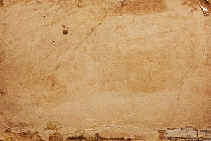 Aged Parchment Texture with Natural Stains and Cracks for Medieval Design HD wallpaper