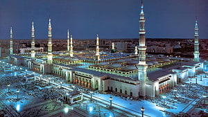 Grand Mosque in Mecca at Night with Illuminated Minarets and Prayer Courtyards HD wallpaper