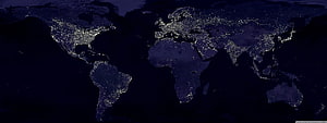 World Map at Night with City Lights on Dark Blue Background HD wallpaper