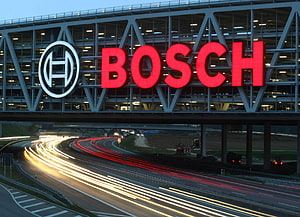 Bosch Corporate Headquarters at Dusk with Highway Light Trails HD wallpaper