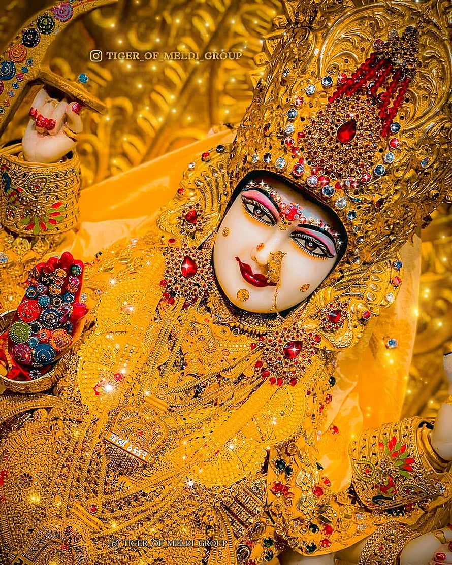 Meldi Maa Malataj Divine Idol Adorned in Gold Jewelry and Red Gemstones HD phone wallpaper