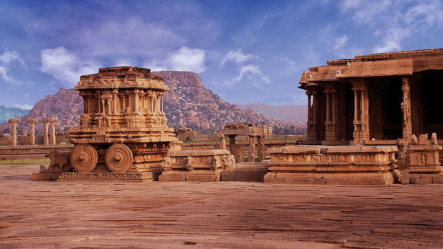 Stone Chariot Temple at Hampi with Distant Rock Hills Under a Blue Sky HD wallpaper