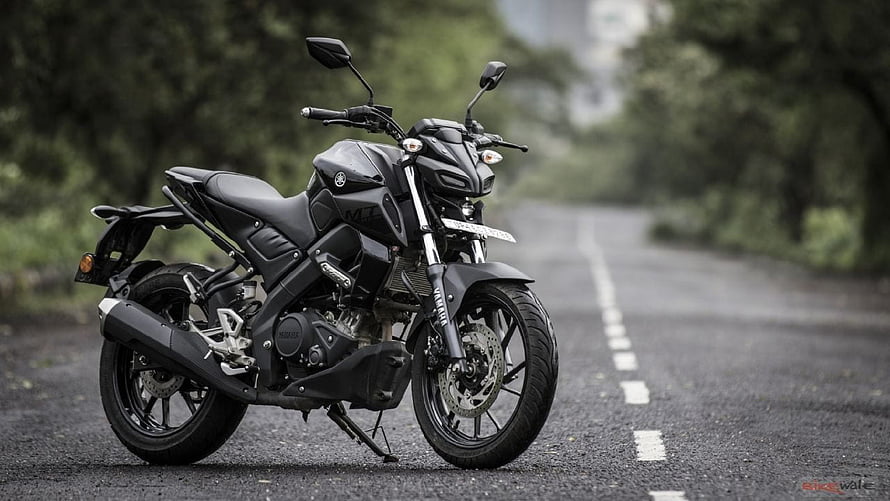 Yamaha MT-15 Black Motorcycle Parked on a Scenic Forest Road HD wallpaper