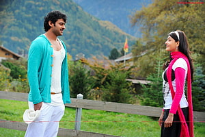 Prabhas and Kajal Agarwal in Darling Telugu Movie Scenic Mountain Setting HD wallpaper