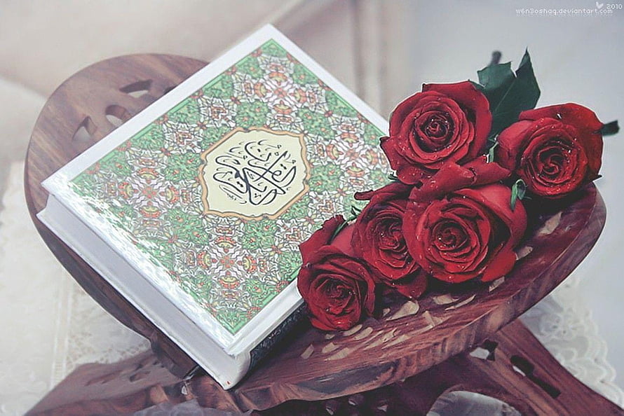 Ornate Quran Book with Red Roses on Carved Wooden Stand HD wallpaper