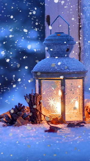 Cozy Christmas Lantern with Pinecones and Twigs in Falling Snow HD phone wallpaper