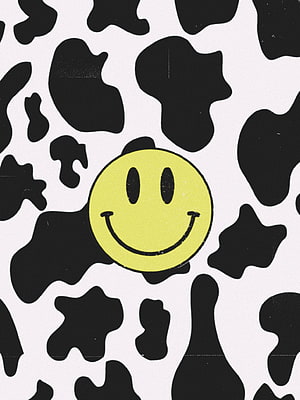 Yellow Smiley Face Icon on Black and White Cow Print Pattern Background HD phone wallpaper