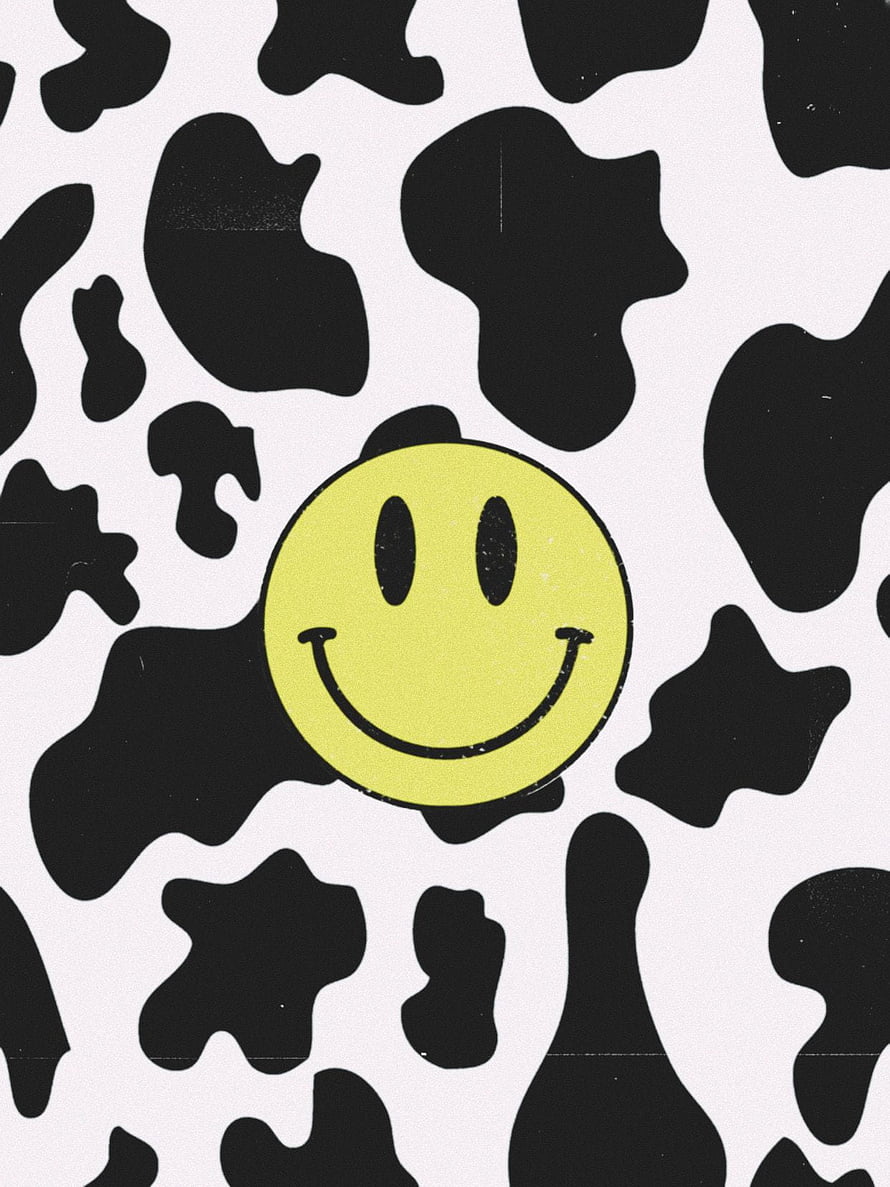 Yellow Smiley Face Icon on Black and White Cow Print Pattern Background HD phone wallpaper